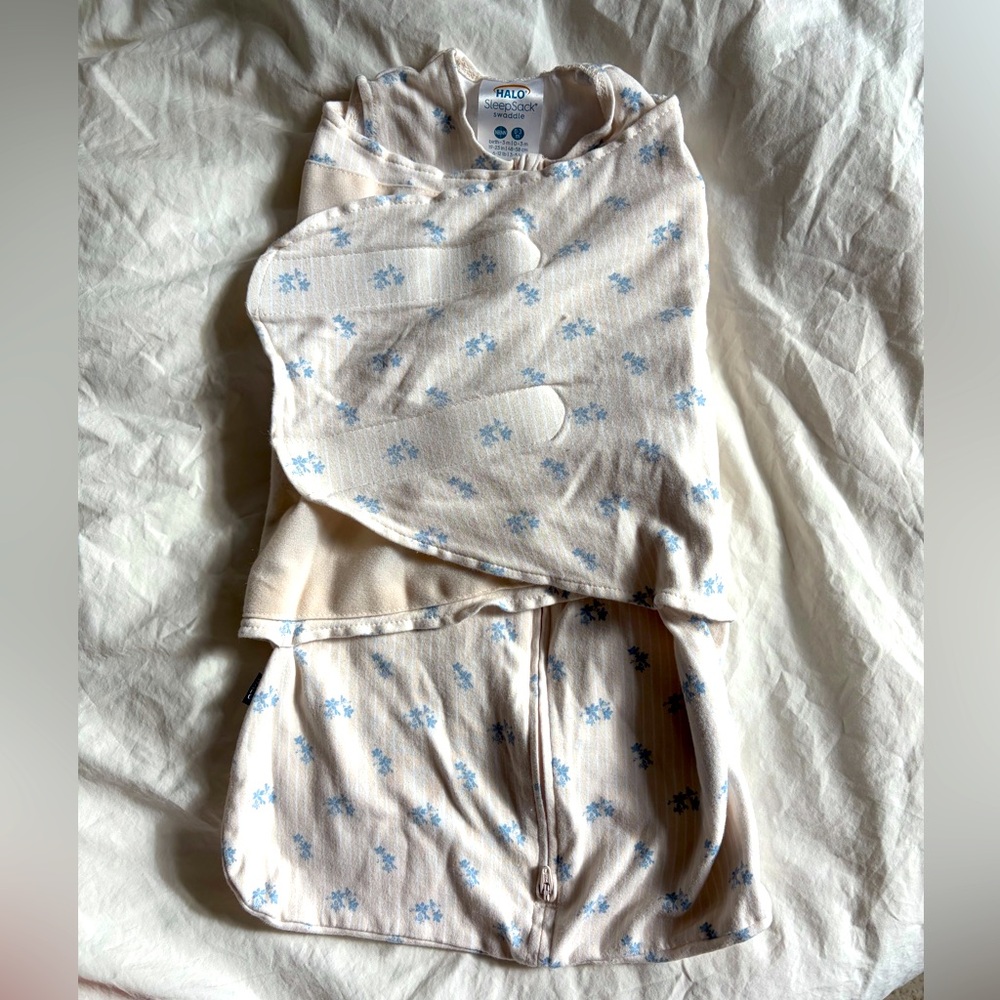 Halo SleepSack Swaddle with Blue Snowflake Pattern